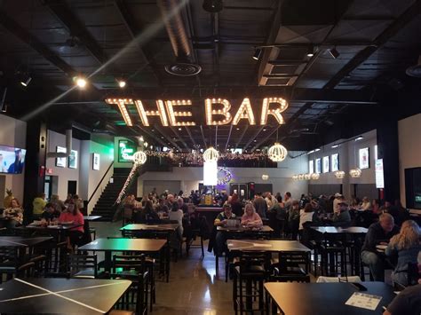 The bar holmgren way - The Bar Holmgren Way is the perfect destination for Sports, Food and Fun. Located just three blocks from historic Lambeau Field, The Bar is your official Packer headquarters. With dart boards ... 